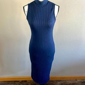 Mid length blue sleeveless turtleneck dress